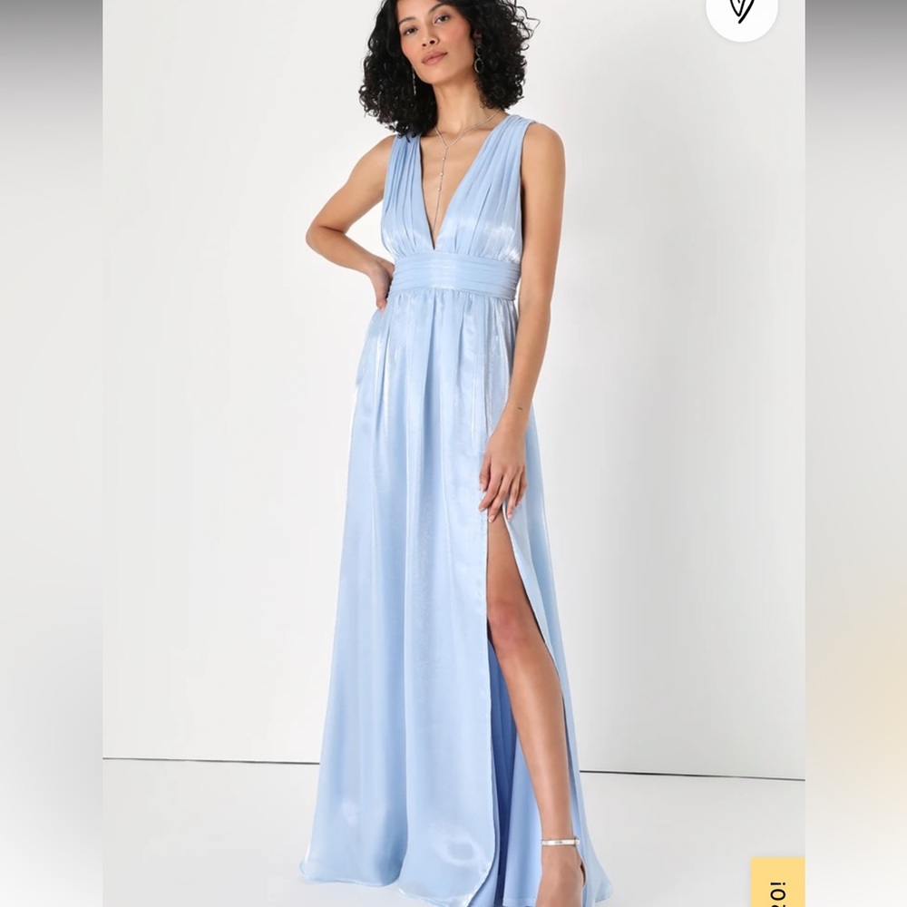 Super cute light blue and shiny dress. Deep V in front and back